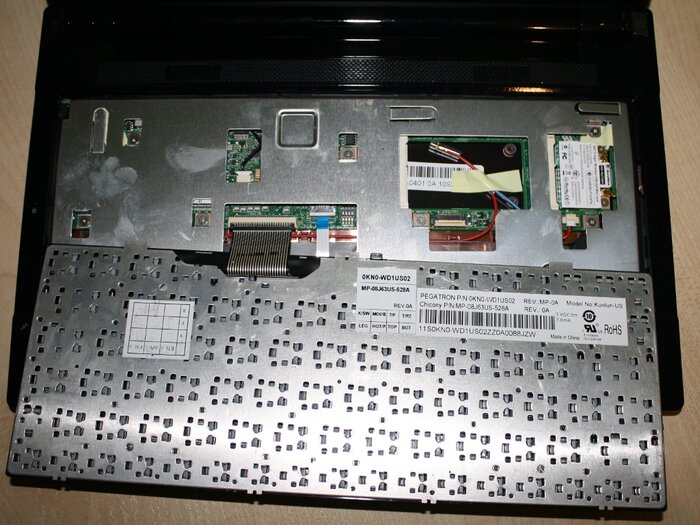 Keyboard open, slots and connectors visible